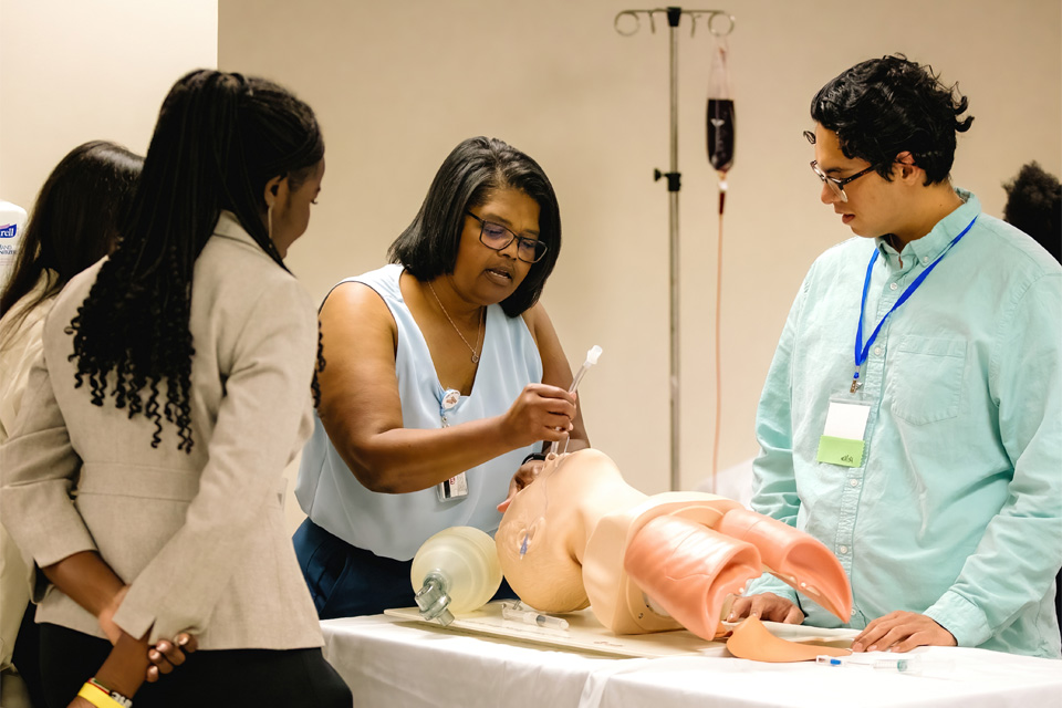 Katrina Wade teaching students in the simulation lab