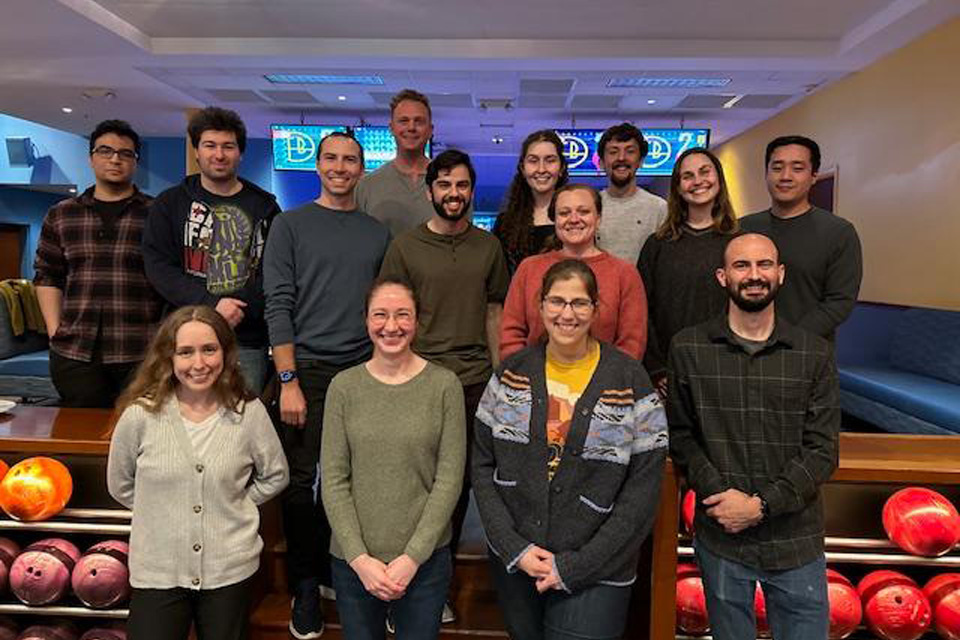 A group of students that are a part of the MD / PhD celebrating their match during bowling