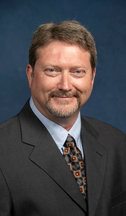 Headshot of John Buerck