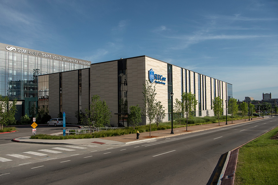 The SLUCare building in midtown St. Louis during the daytime 